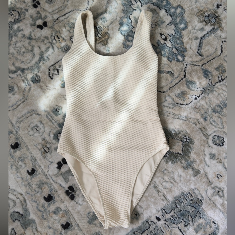 Cream Anine Bing
Jace one-piece swimsuit.